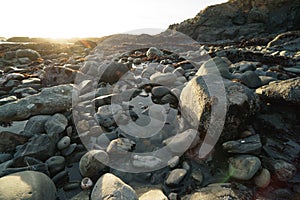 Low tide tide pools exposed at sunset
