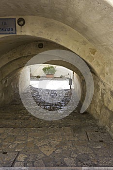 Low underpass street in Matera, Italy