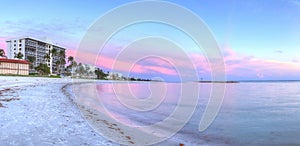 Lowdermilk Beach sunset over powder white sand