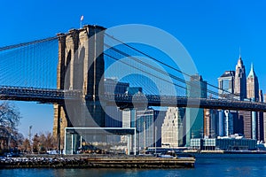 Lower Manhattan Downtown skyline panorama from Brooklyn Bridge Park riverbank, New York City, USA