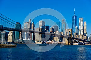 Lower Manhattan Downtown skyline panorama from Brooklyn Bridge Park riverbank, New York City, USA