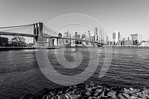 Lower Manhattan Downtown skyline panorama from Brooklyn Bridge Park riverbank, New York City, USA