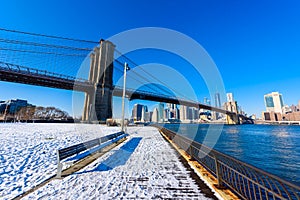 Lower Manhattan Downtown skyline panorama from Brooklyn Bridge Park riverbank, New York City, USA