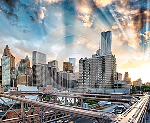 Lower Manhattan sunset skyline from Brooklyn Bridge