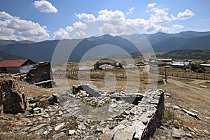 Lower Omalo village and a ruin of a tower in Tusheti region, Georgia