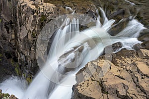 Lower stage of the Svartifoss waterfall - Iceland photo