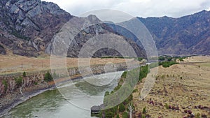 Lowflying on a drone over Teldykpen rapids on Altai river Katun near Oroktoi at cloudy day