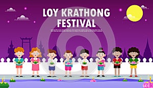 Loy Krathong Festival banner concept with cute Thai Children in National costume holding krathong in full moon night and lanterns