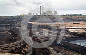 The Loy Yang Power station seen from across the open cut coal mine.