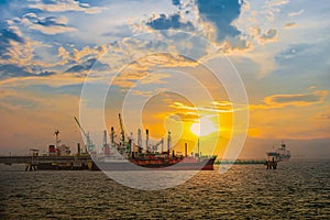 LPG tanker ship docking at sunset