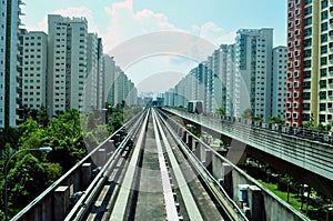 LRT train railings with apartments photo