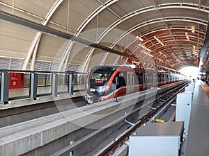 LRT Train in Station with Curved Roof