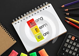 LTC - Long Term Care acronym on notepad, medical concept background