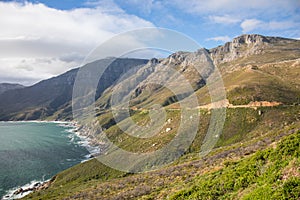 Lte afternoon at mountain range against ocean in Houtbay, Cape Town