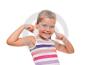 Lttle girl putting her fingers to her head on white background