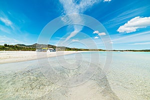 Lu Impostu beach under a clear sky