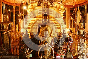 Luang Phor Phet, the principal Buddha image and beautiful Buddha statues at Wat Phra That Chom Thong Worawihan.