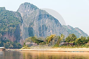 Luang Prabang, Laos - Mar 04 2015: Slow boat cruise on the Mekong River. Popular tourist adventure trip by slow boat from