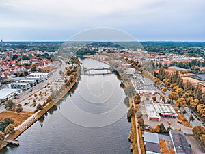 Lubeck aerial view from drone, Germany. Homes and city river