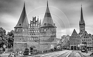 Lubeck, Germany - July 22, 2016: Tourists visit famous Holstentor gate in summer, Schleswig-Holstein, northern Germany