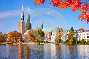 Lubeck old town reflected in Trave river, old town