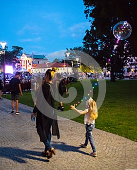 Lublin, Poland - Jul 27, 2018: LED transparent balloon with multi-colored luminous garland
