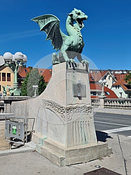 Lublyana dragon sitting proudly on the entrance on the bridge