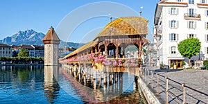 Lucerne city at Reuss river with KapellbrÃ¼cke and Pilatus mountain panorama in Switzerland