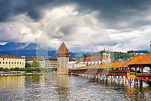 Lucerne, Switzerland - Famous wooden Chapel Bridge, oldest wooden covered bridge in Europe. Luzern