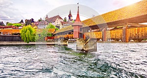 Lucerne, Switzerland - Famous wooden Chapel Bridge, oldest wooden covered bridge in Europe. Luzern