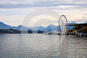 Lucerne, Switzerland-October 18,2019:View of Landscape and Lucerne wheel is landmark near the river in Lucerne, Switzerland