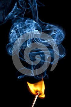 Lucifer/match burning with smoke