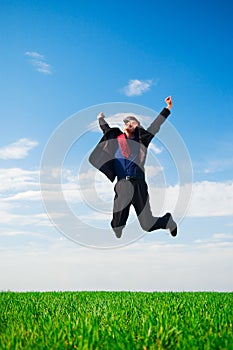 Lucky businessman in jump