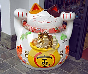 Lucky cat (Maneki neko) statue photo