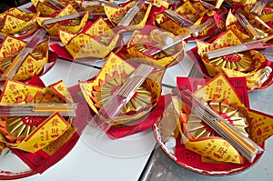 Lucky paper wishing lantern with Chinese poems and incense sticks to pray for god in Asia