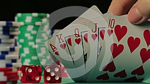 Lucky poker player catches royal flush, successful person wins a game, POV
