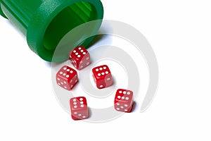 Lucky sixes spilled from dice cup
