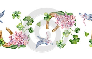 Lucky symbol horseshoe and clover watercolor isolated on white. Seamless border. Painted hydrangea and bird. Irish