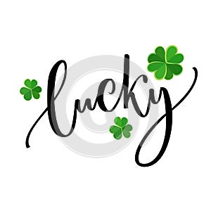 Lucky word - St. Patrick`s day lettering for t-shirts and cards. Brush calligraphy design with shamrock