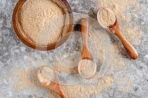 Lucuma Powder In Wooden Bowl