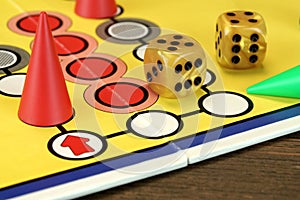 Ludo Or Parchis Game Board With Playing Figures And Two Dices photo