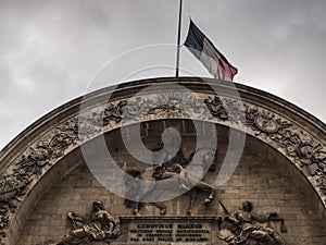 Ludovicus Magnus, close-up of the arch just above the main entrance gate to the inner courtyard of the Musee Des La`Armee in Pari