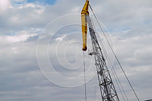 Luffing crane against of blue sky
