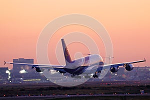 Lufthansa Airbus A380 plane landing at Frankfurt Airport, FRA, sunrise