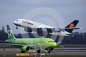Lufthansa A380 plane taking off, S7 plane taxiing