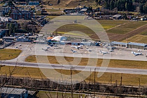 Lugano, Switzerland, apron, terminal, and control Tower at Lugano Regional Airport LUG, LSZA aerial view