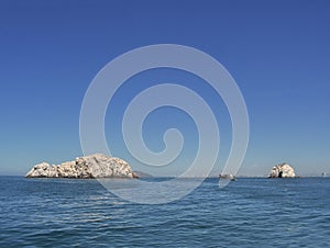 Sea with some rock formations photo