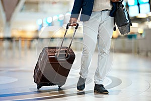 Luggage, airport and black man travel for business opportunity, international career and immigration. Professional