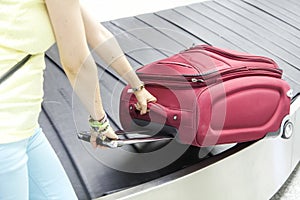 Luggage in airport conveyor belt