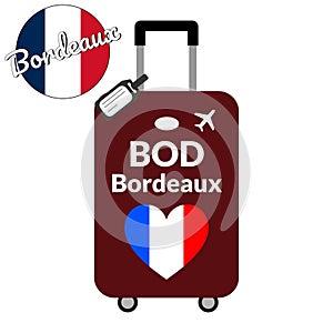 Luggage with airport station code IATA or location identifier and destination city name Bordeaux, BOD. Travel to France